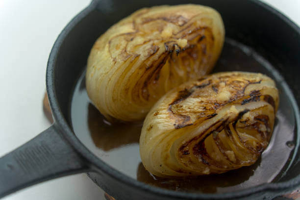 istock New onion steak served in a skillet 2158186429