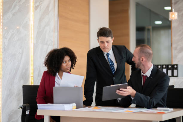 istock Diverse business team discussing project at office desk, Concept of teamwork 2158189342