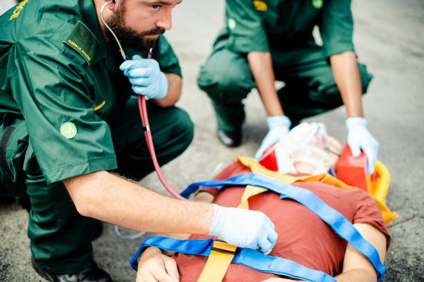 istock Paramedic team rescuing a critical patient 2158189397