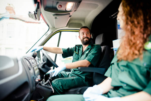 istock Paramedic man driving an ambulance 2158189417