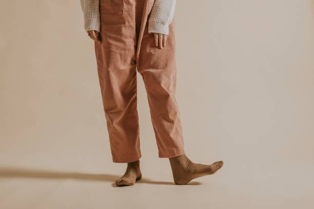 istock Woman in pink dungarees, half body 2158191722
