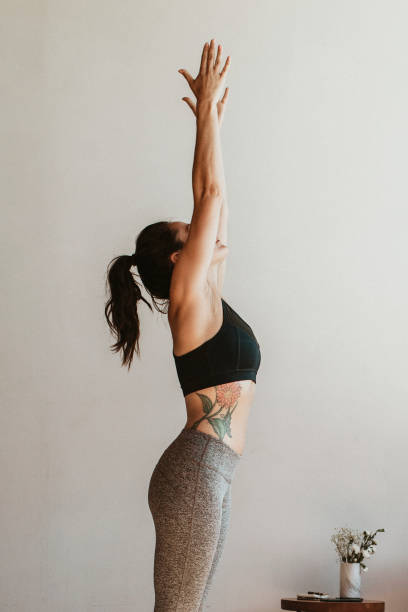 istock Sportive woman doing a Vriksasana pose 2158192160