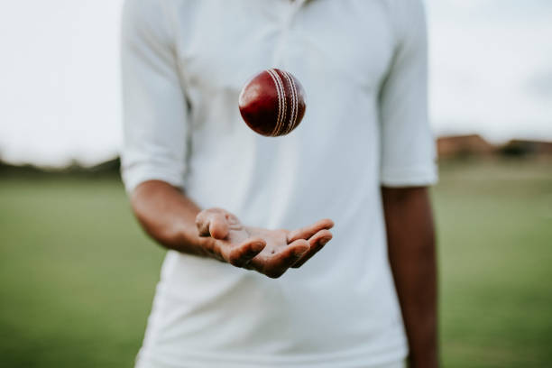 istock Cricket player ready to throw the ball 2158192271