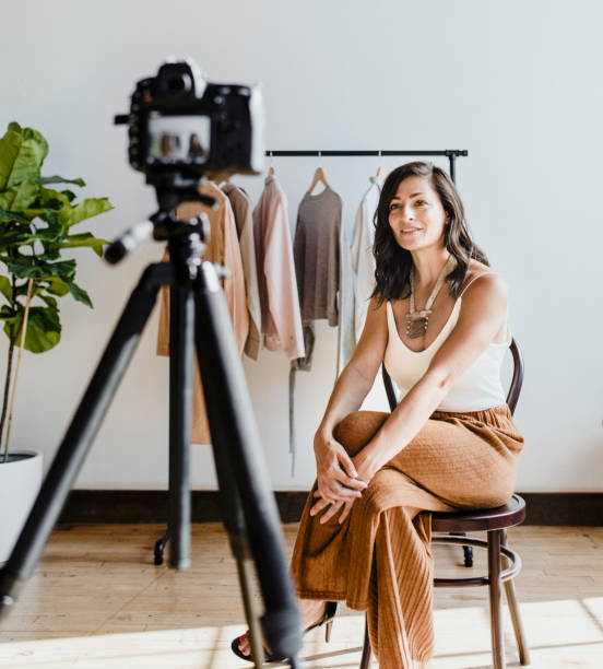 istock Fashion stylist working with clothes 2158192419