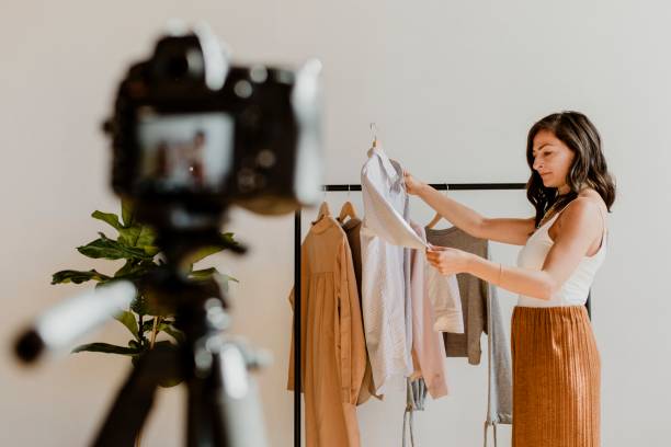 istock Fashion stylist working with clothes 2158192423