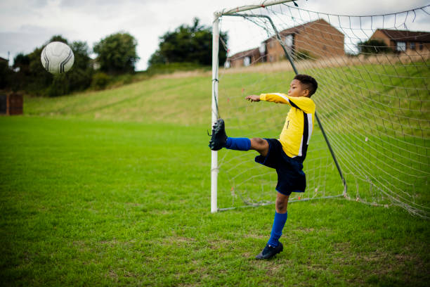 Junior football goalie in action