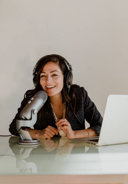 istock Female radio host broadcasting live in a studio 2158193794