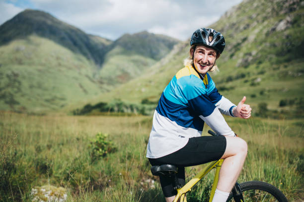 Happy blond cyclist on a bike