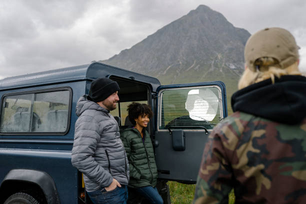 istock Group of friends taking break while on a road trip 2158194044
