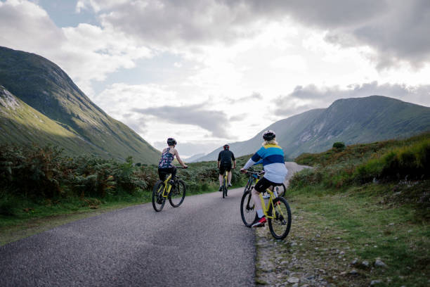 istock Group of cyclists in Glen Etive, Scotland 2158194214