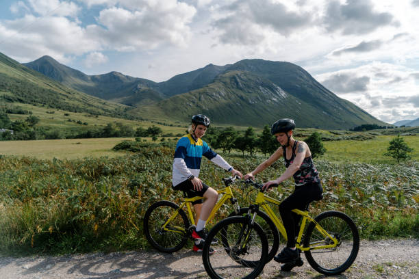 istock Cyclists in Glen Etive, Scotland 2158194322