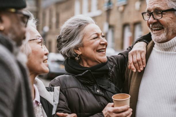 istock Happy friends walking together in the streets 2158194640