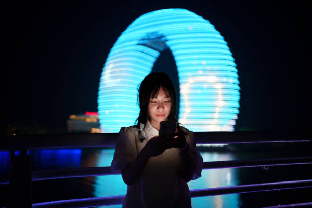 istock Female tourist looking at smartphone 2158194750