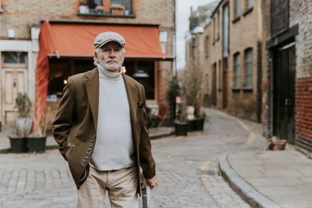istock Gentleman walking on cobblestone street 2158194767