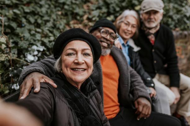 istock Senior friends taking selfie in the park 2158194849