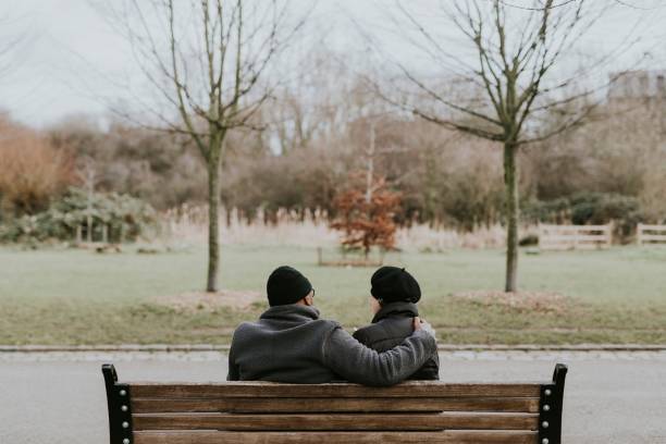 istock Lovely old couple on park bench background 2158194896