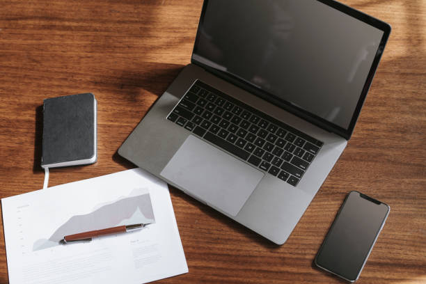 Laptop on a wooden table