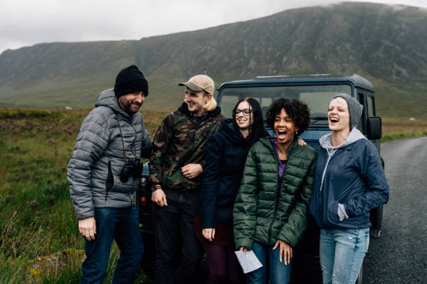 Group of friends taking a break from driving