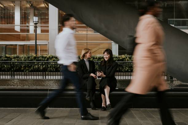 istock Businesswomen chatting during lunch break 2158195425