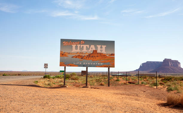 Monument Valley, United States - June 9th, 2024: Welcome to Utah Sign viewed from  Arizona on Highway 163 in Monument Valley.