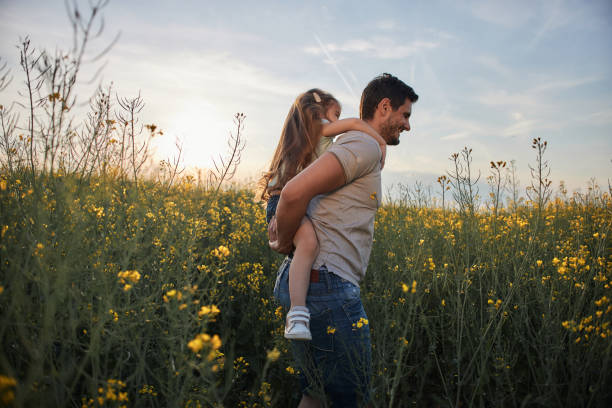 istock Father and daughter enjoying nature 2158199038
