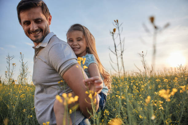 istock Father and daughter enjoying nature 2158199055