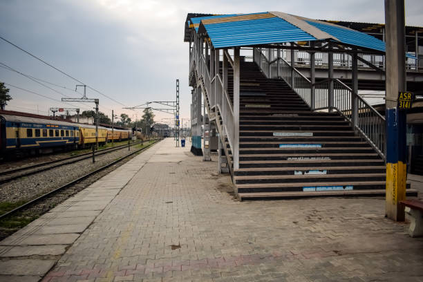 istock Amritsar, India, June 03 2024 - Indian railway train at Amritsar railway station platform during morning time, Colourful train at Amritsar, Punjab railway station 2158201767