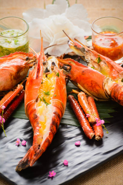 istock Grilled Prawn Decorated on a black plate 2158202464