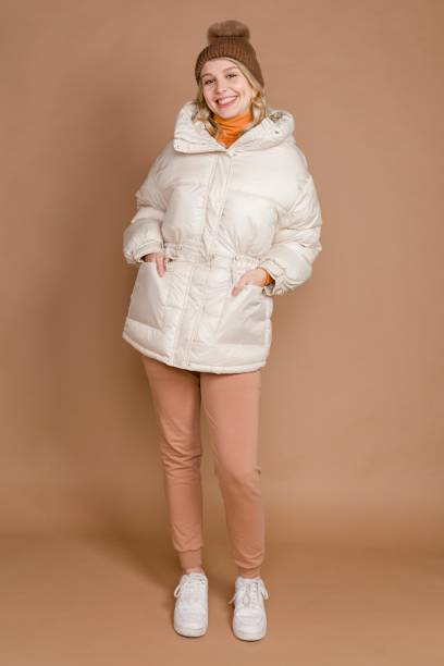 istock Full body woman in winter clothes 2158202922
