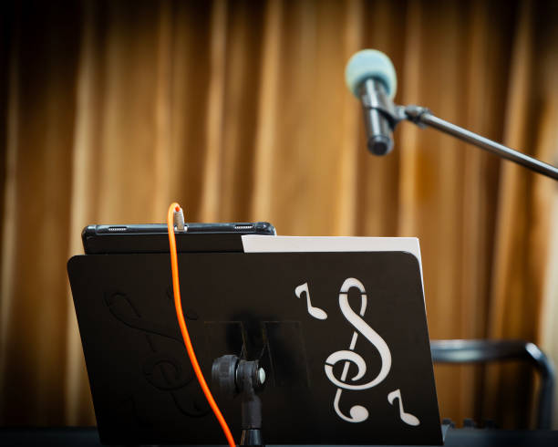 istock Musician's sheet music stand with microphone 2158204244