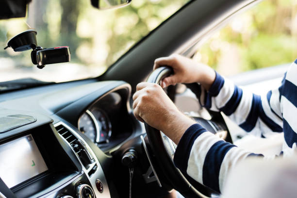 istock Man driving a family car 2158204506