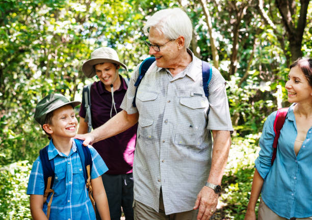 istock Family hiking in a forest 2158204647