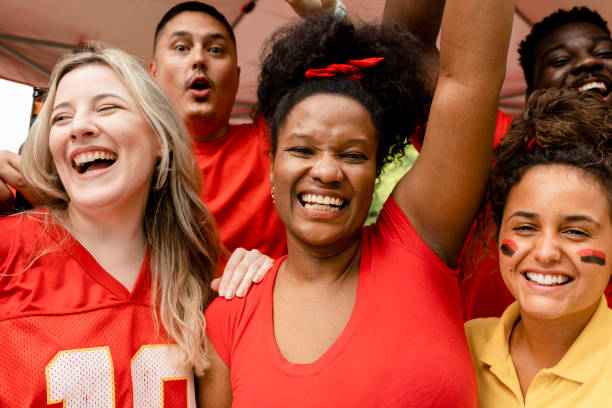istock American football supporters cheering on their team 2158204707