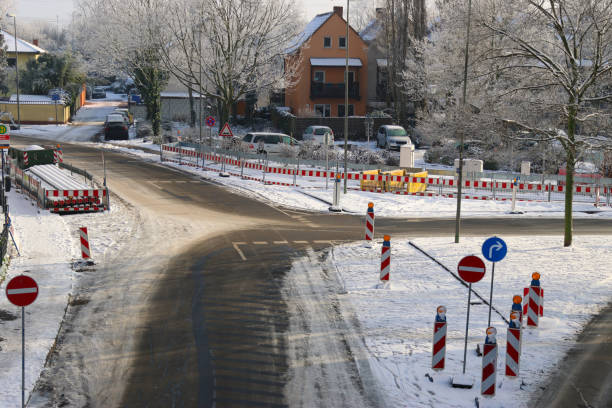 istock Traffic construction site in winter and snow with traffic signs 2158208965