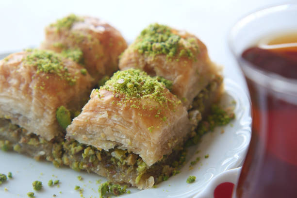 istock handmade turkish dessert baklava and a turkish tea on on table 2158210499