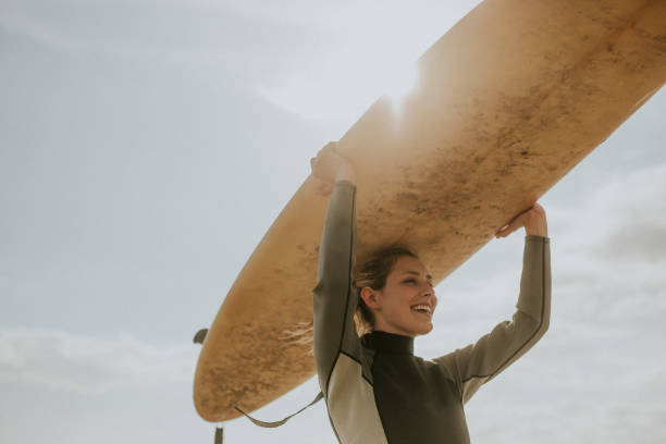 istock Happy surfer at the beach 2158212565