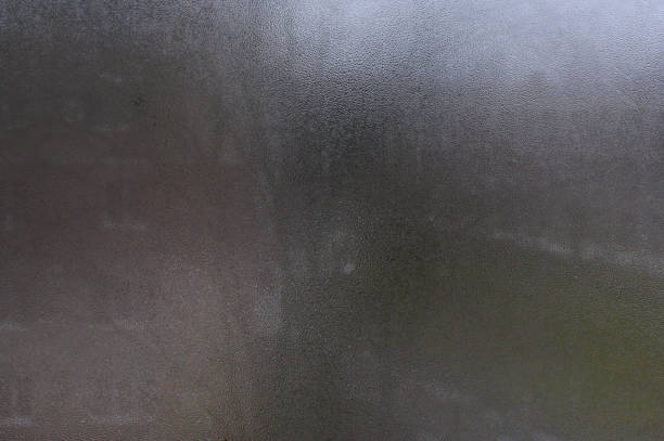 textured background of a fogged wet window