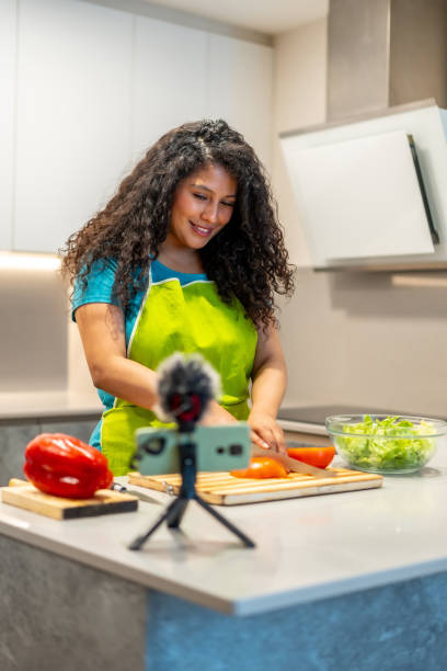 istock Influencer recording a health food tutorial at home 2158215559