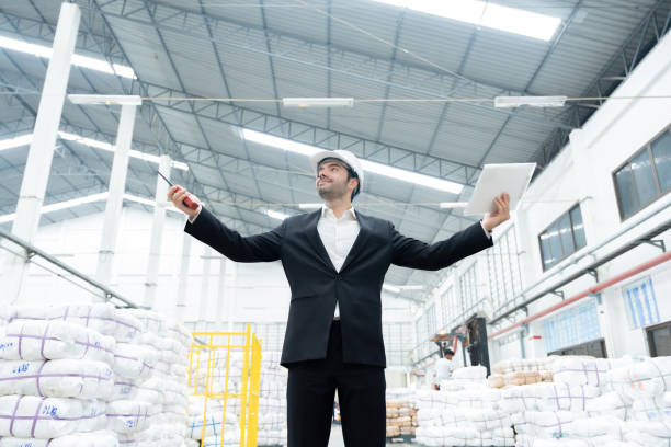 istock American male engineer presenting The industrial facility's prowess in quality control and continuous improvement ensures consistent product excellence. It is a plastic and steel export business. 2158216620