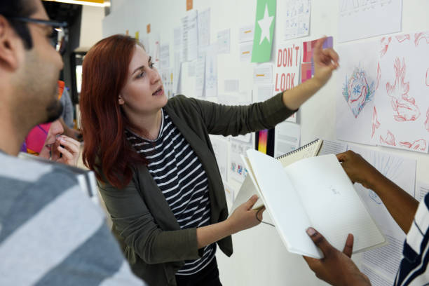 istock Group of diverse people attending startup business course 2158217417
