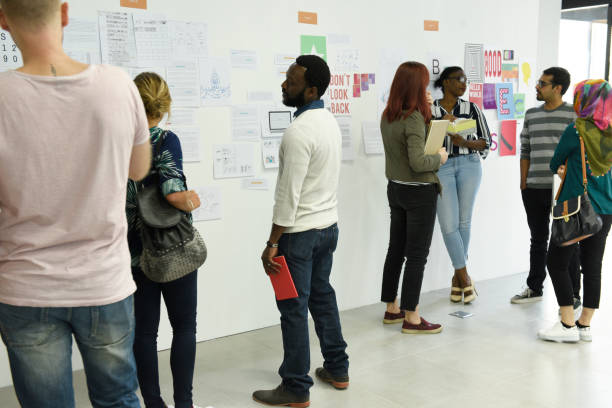 istock Group of diverse people attending startup business course 2158217495