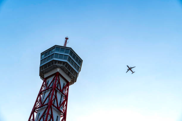istock Hakata Port Tower and airplane 2158221013