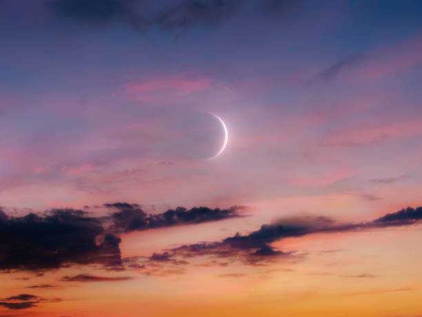 istock New Moon in the sky at sunset. Big moon rising. 2158225056