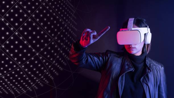 istock Woman playing a virtual video game on virtual screen 2158226239