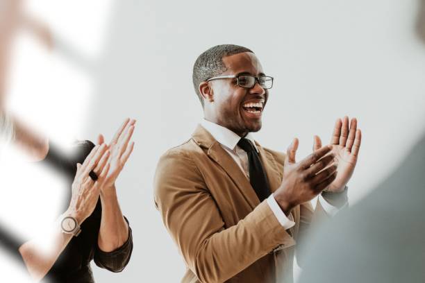 istock Diverse business people applauding with joy 2158226521