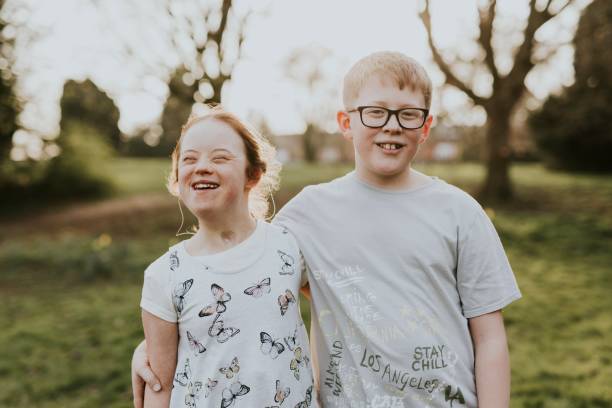 istock Happy siblings in the garden 2158226550