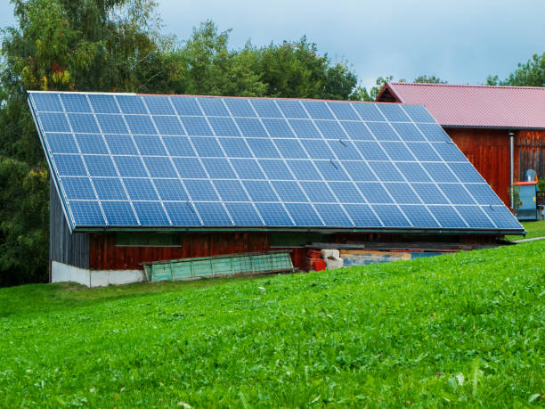 istock Photovoltaic covered barn in Bavaria 2158229136