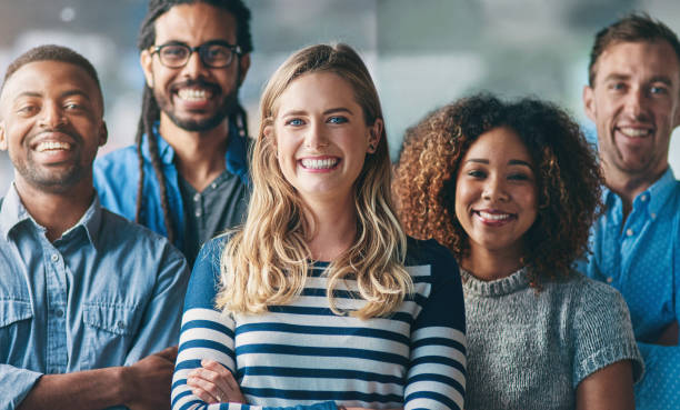 istock Group, people and diversity in portrait at startup with smile, support and creativity in modern office. Women, men and team building with solidarity at media agency for collaboration in workplace 2158229880