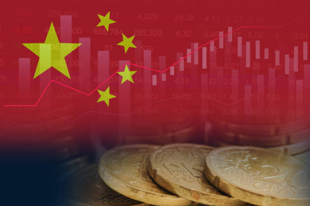 istock China flag on stock investment trading with graph. 2158230105