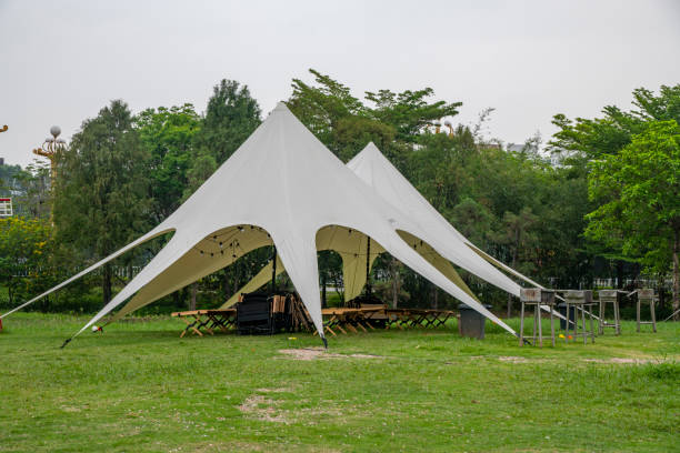 istock Camping tents on outdoor park grasslands 2158236794